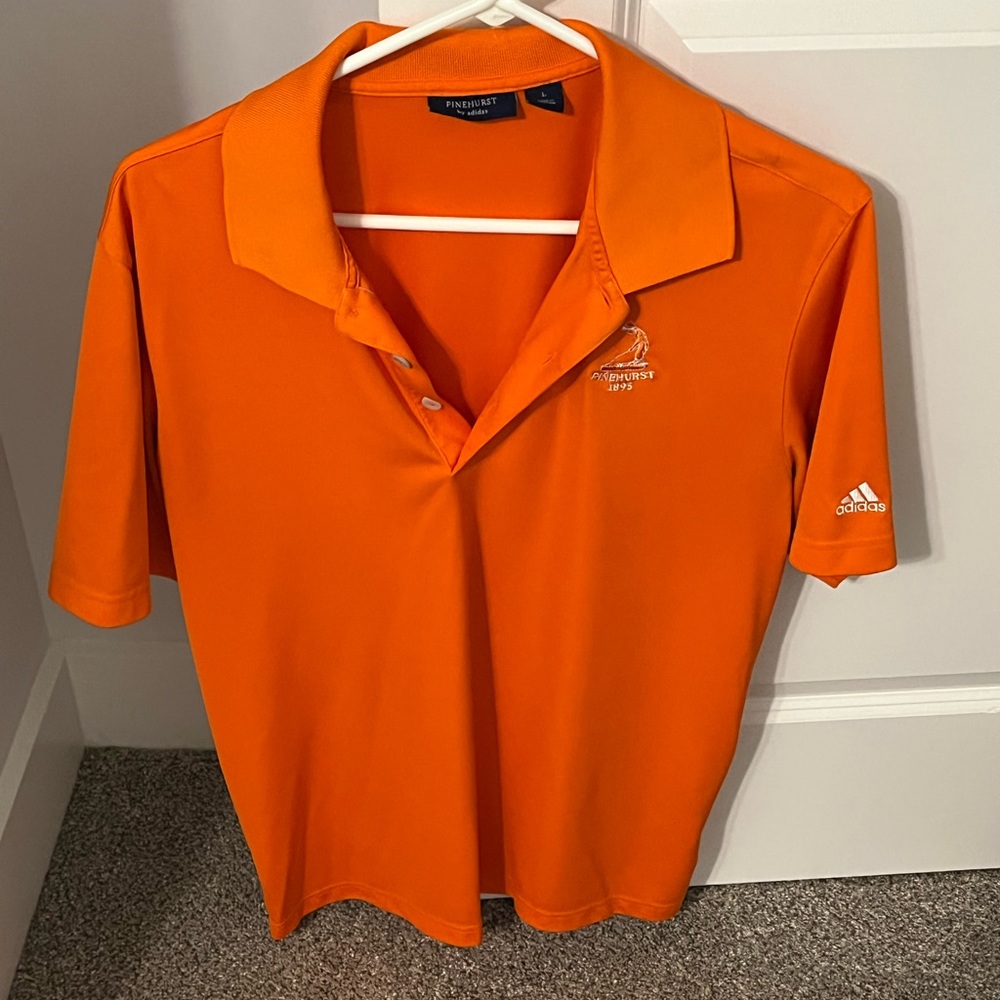 Adidas Pinehurst Polo size L orange in color